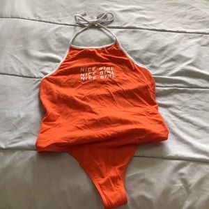 Halter top orange body suit